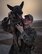 U.S. Air Force Staff Sgt. Patrick Cushing a Security Forces Squadron military working dog handler and his K-9 partner Tuko both assigned to the 380th Air Expeditionary Squadron, share a moment of affection during a break in training at Al Dhafra Air Base, United Arab Emirates, May 14, 2018. Max’s handler Sgt. Pontello is in the process of adopting Max this year marking 11 years of faithful military service. (U.S. Air National Guard photo by: Tech. Sgt. Nieko Carzis)