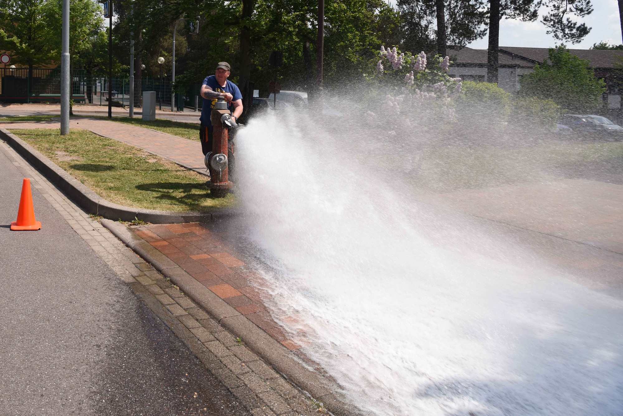 Thomas Bredel, water-plant mechanic, 786th CES, tests the water pressure of a fire hydrant on Ramstein Air Base, Germany, May, 9, 2018. Hydrant flow tests are conducted every spring.