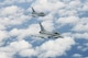 A pair of Royal Air Force Typhoon fighters fly over the North Sea May 17, 2018. The fighters received fuel from an RAF Voyager aircraft as part of the 5th annual European Tanker Symposium held on RAF Mildenhall, England. (U.S. Air Force photo by Tech. Sgt. David Dobrydney)