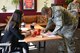 A newly arrived Airman signs for their $10 gift card at the Airman & Family Readiness Center as part of the 48th Force Support Squadron's "You Got Served" events at Royal Air Force Lakenheath, England, May 8, 2018. During the event Lt. Col. Moon and civilians at the 48th Force Support Squadron Marketing section selected two Airmen to recieve a $10 gift card each.