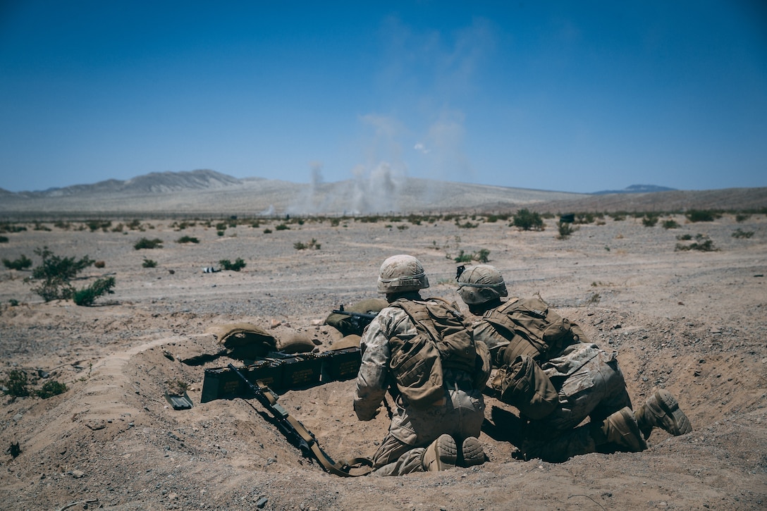 Marines with 3rd Battalion, 2nd Marine Regiment, 2nd Marine Division, go condition one during the Regiment Assault Course at Training Area Quackenbush as a part of Integrated Training Exercise 3-18 aboard the Marine Corps Air Ground Combat Center, Twentynine Palms, Calif., May 15, 2018. The purpose of ITX is to create a challenging, realistic training environment that produces combat-ready forces capable of operating as an integrated Marine Air Ground Task Force. (U.S. Marine Corps photo by Lance Cpl. William Chockey)