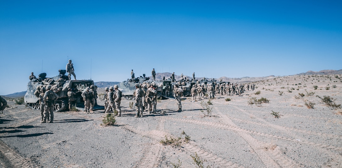 Marines with 3rd Battalion, 2nd Marine Regiment, 2nd Marine Division, step out of the Amphibious Assault Vehicles at the conclusion of the Regiment Assault Course at Training Area Quackenbush as a part of Integrated Training Exercise 3-18 aboard the Marine Corps Air Ground Combat Center, Twentynine Palms, Calif., May 15, 2018. The purpose of ITX is to create a challenging, realistic training environment that produces combat-ready forces capable of operating as an integrated Marine Air Ground Task Force. (U.S. Marine Corps photo by Lance Cpl. William Chockey)