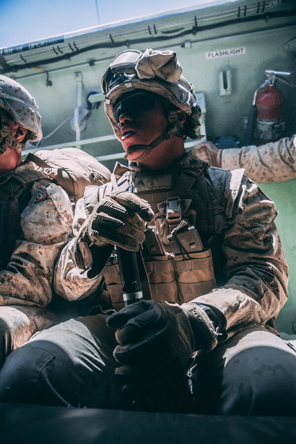 A Marine with 3rd Battalion, 2nd Marine Regiment, 2nd Marine Division, waits inside a Amphibious Assault Vehicle during the Regiment Assault Course at Training Area Quackenbush as a part of Integrated Training Exercise 3-18 aboard the Marine Corps Air Ground Combat Center, Twentynine Palms, Calif., May 15, 2018. The purpose of ITX is to create a challenging, realistic training environment that produces combat-ready forces capable of operating as an integrated Marine Air Ground Task Force. (U.S. Marine Corps photo by Lance Cpl. William Chockey)