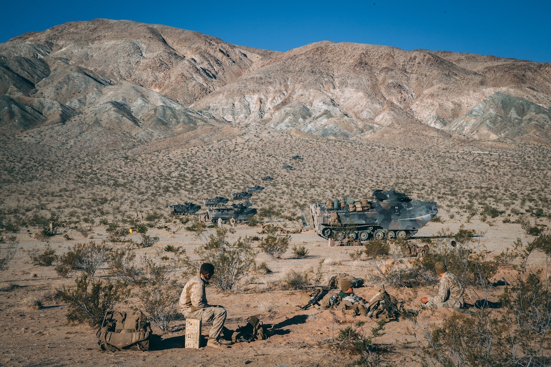 Marines with 3rd Battalion, 2nd Marine Regiment, 2nd Marine Division, dig into the defense during the Regiment Assault Course at Training Area Quackenbush as a part of Integrated Training Exercise 3-18 aboard the Marine Corps Air Ground Combat Center, Twentynine Palms, Calif., May 15, 2018. The purpose of ITX is to create a challenging, realistic training environment that produces combat-ready forces capable of operating as an integrated Marine Air Ground Task Force. (U.S. Marine Corps photo by Lance Cpl. William Chockey)