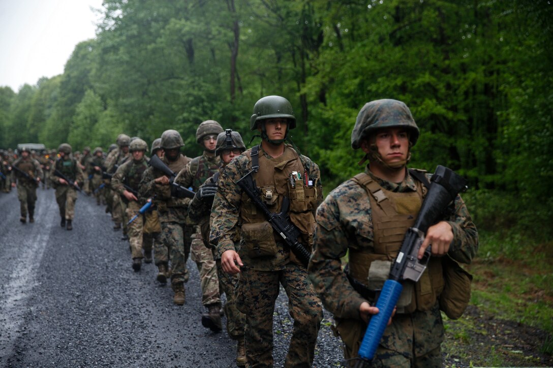 U.S. Marines with 6th Engineer Support Battalion, 4th Marine Logistics Group, and British commando’s with 131 Commando Squadron Royal Engineers, British Army, participate in a five mile hike with a full gear load during exercise Red Dagger at Fort Indiantown Gap, Pa., May 17, 2018.