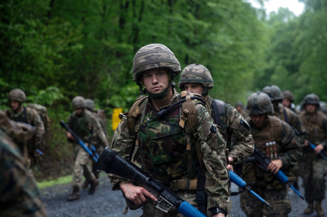 British Army Spr. Christopher Compton, commando with 131 Commando Squadron Royal Engineers, British Army, participates in a five mile hike with U.S. Marines with 6th Engineer Support Battalion, 4th Marine Logistics Group, and commando’s with 131 Commando Squadron RE, British Army during exercise Red Dagger at Fort Indiantown Gap, Pa., May 17, 2018.
