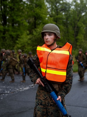 U.S. Marine Private First Class Cody A. Evans, combat engineer with Engineer Company C, 6th Engineer Support Battalion, 4th Marine Logistics Group, posts as a road guard during a five mile hike with Marines with 6th ESB, 4th MLG, and British commando’s with 131 Commando Squadron Royal Engineers, British Army, during exercise Red Dagger at Fort Indiantown Gap, Pa., May 17, 2018.