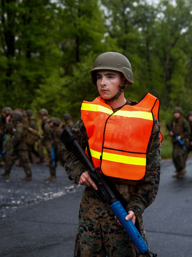 U.S. Marine Private First Class Cody A. Evans, combat engineer with Engineer Company C, 6th Engineer Support Battalion, 4th Marine Logistics Group, posts as a road guard during a five mile hike with Marines with 6th ESB, 4th MLG, and British commando’s with 131 Commando Squadron Royal Engineers, British Army, during exercise Red Dagger at Fort Indiantown Gap, Pa., May 17, 2018. Exercise Red Dagger is a bilateral training exercise that gives Marines an opportunity to exchange tactics, techniques and procedures as well as build working relationships with their British counterparts. (U.S. Marine Corps photo by Sgt. Melanie Wolf/Released)