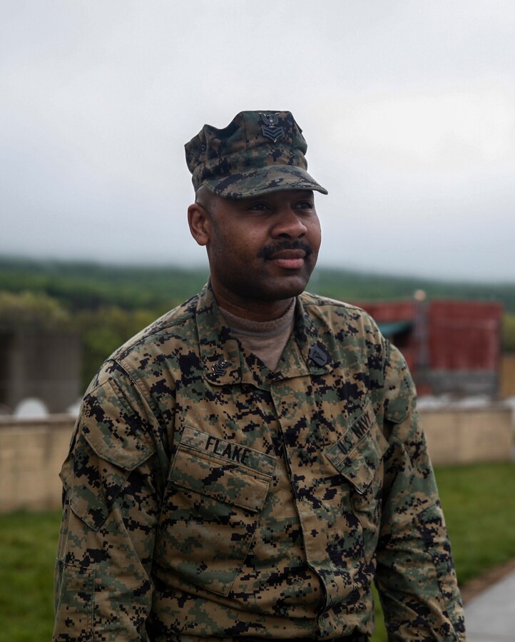 U.S. Navy Petty Officer 1st Class Brandon D. Flake, hospital corpsman with Engineer Support Company, 6th Engineer Support Battalion, 4th Marine Logistics Group, poses for a photo during exercise Red Dagger at Fort Indiantown Gap, Pa., May 17, 2018. Exercise Red Dagger is a bilateral training exercise that gives Marines an opportunity to exchange tactics, techniques and procedures as well as build working relationships with their British counterparts. (U.S. Marine Corps photo by Sgt. Melanie Wolf/Released)