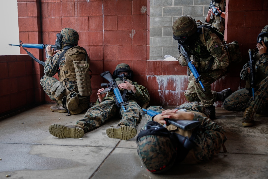 U.S. Marines with 6th Engineer Support Battalion, 4th Marine Logistics Group, and British commando’s with 131 Commando Squadron Royal Engineers, British Army, simulate a live scenario at the military operations on urbanized terrain, or MOUT structure, during exercise Red Dagger at Fort Indiantown Gap, Pa., May 17, 2018.