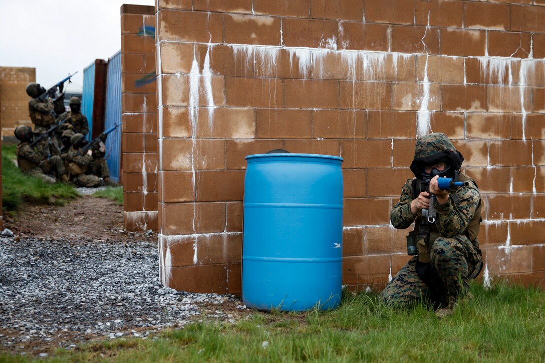 U.S. Marine Lance Cpl. Eric V. Rodriguez, motor vehicle operator with Engineer Company C, 6th Engineer Support Battalion, 4th Marine Logistics Group, posts security for his platoon of Marines with 6th ESB, 4th MLG and British commando’s with 131 Commando Squadron Royal Engineers, British Army, during a simulated live scenario at the military operations on urbanized terrain, or MOUT structure, during exercise Red Dagger at Fort Indiantown Gap, Pa., May 17, 2018.