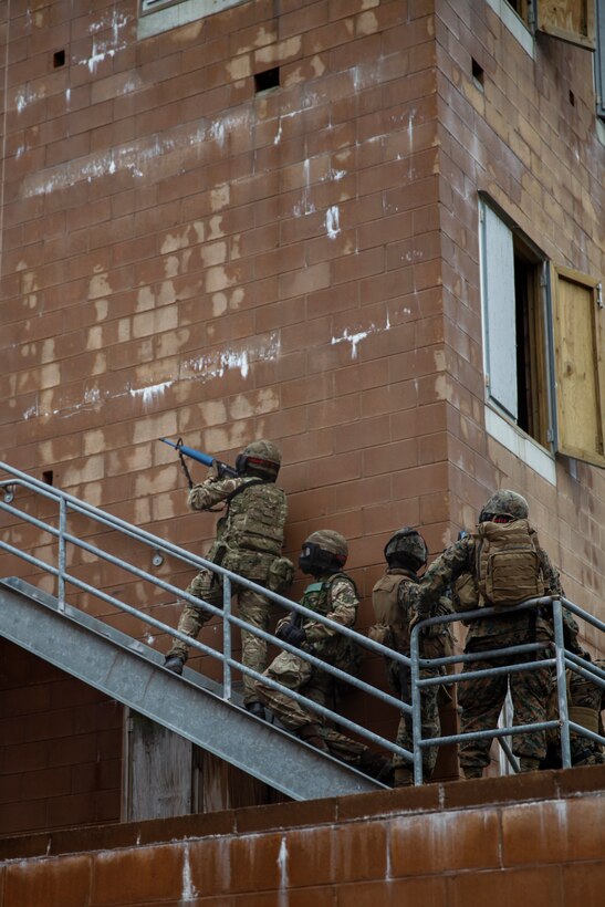 U.S. Marines with 6th Engineer Support Battalion, 4th Marine Logistics Group, and British commando’s with 131 Commando Squadron Royal Engineers, British Army, clear a building during a simulated live scenario at the military operations on urbanized terrain, or MOUT structure, during exercise Red Dagger at Fort Indiantown Gap, Pa., May 17, 2018.