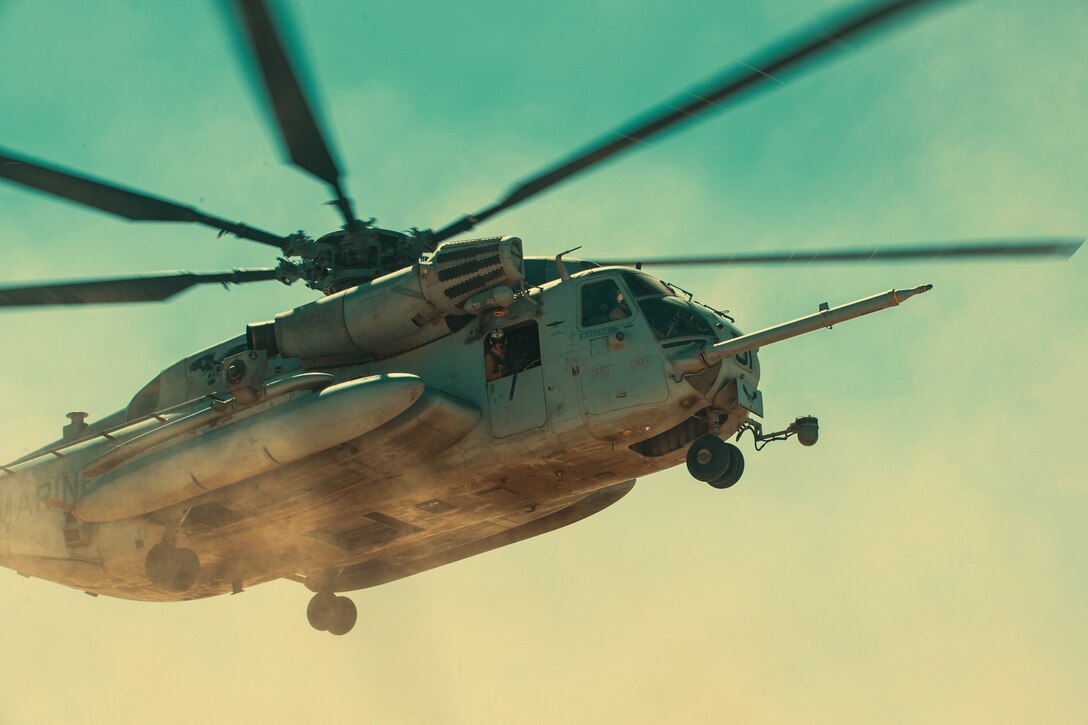 A CH-53 Super Stallion prepares to land during an aerial assault course as part of Integrated Training Exercise 3-18 aboard the Marine Corps Air Ground Combat Center, Twentynine Palms, Calif., May 10, 2018. The purpose of ITX is to create a challenging, realistic training environment that produces combat-ready forces capable of operating as an integrated Marine Air Ground Task Force. (U.S. Marine Corps photo by Lance Cpl. Isaac Cantrell)
