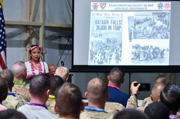 Sgt. Kristal V. Baradi, 40th Composite Supply Company, 541st Combat Support Sustainment Battalion, speaks about Philippine history at an Asian American, Pacific Islander cultural observance at Camp Buehring, Kuwait, May 12, 2018. Baradi focused on the islands experiences from Europeans arriving at the nation through World War II and Filipino independence at the cultural observance, which was held to celebrate the contributions of Pacific Islanders and Asian Americans and to raise awareness of Asian heritage among personnel on the installation. A similar event is scheduled for Camp Arifjan, Kuwait, on May 26.