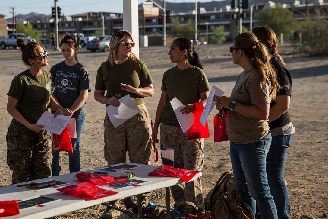 Spouses of Marines and sailors with Combat Logistics Battalion 7 check in for the unit’s Jane Wayne Day aboard the Marine Corps Air Ground Combat Center, Twentynine Palms, Calif., May 10, 2018. Jane Wayne Day gave the spouses a glimpse into the day-to-day lives of their active duty spouses through the combat convoy simulator, a live-fire range and a combat fitness test. (U.S. Marine Corps photo by Lance Cpl. Margaret Gale)