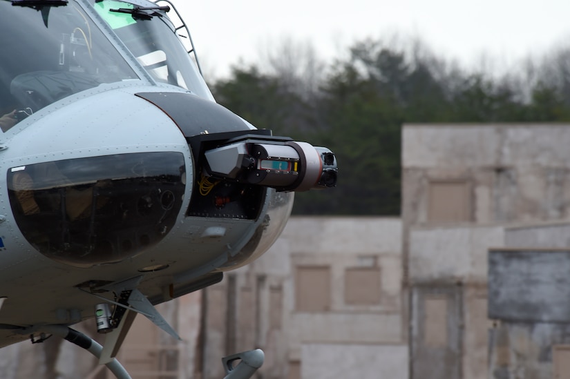 An UH-1 “Huey” helicopter equipped with an Office of Naval Research-sponsored Autonomous Aerial Cargo Utility System kit makes an approach for landing during final testing at Marine Corps Base Quantico, Va.