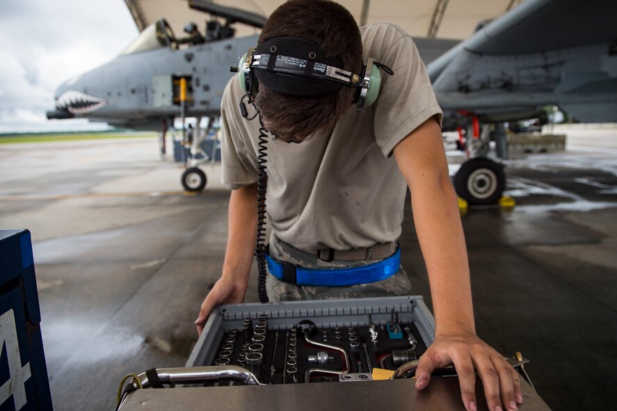 Airman 1st Class Jacob Curry, 23d Aircraft Maintenance Squadron crew chief, inspects his tools prior to launching an A-10C Thunderbolt II, May 17, 2018, at Moody Air Force Base, Ga. Airmen conduct routine training missions in the airspace surrounding Moody to remain current on their tactics and procedures. While helping pilots remain proficient, training also gives crew chiefs and maintainers the opportunity to remain proficient at launching and maintaining the aircraft. (U.S. Air Force photo by Senior Airman Janiqua P. Robinson)
