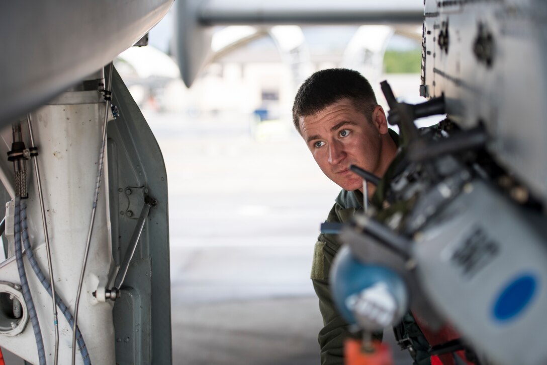 Capt. Aaron Seyfried, 74th Fighter Squadron A-10C Thunderbolt II pilot, performs a preflight systems check prior to flying May 17, 2018, at Moody Air Force Base, Ga. Airmen conduct routine training missions in the airspace surrounding Moody to remain current on their tactics and procedures. While helping pilots remain proficient, training also gives crew chiefs and maintainers the opportunity to remain proficient at launching and maintaining the aircraft. (U.S. Air Force photo by Senior Airman Janiqua P. Robinson)