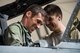 Lt. Col. Jeremy Johnston, 23d Fighter Group A-10C Thunderbolt II pilot, left, laughs with Airman 1st Class Jacob Curry, 23d Aircraft Maintenance Squadron crew chief, prior to flying, May 17, 2018, at Moody Air Force Base, Ga. Airmen conduct routine training missions in the airspace surrounding Moody to remain current on their tactics and procedures. While helping pilots remain proficient, training also gives crew chiefs and maintainers the opportunity to remain proficient at launching and maintaining the aircraft. (U.S. Air Force photo by Senior Airman Janiqua P. Robinson)