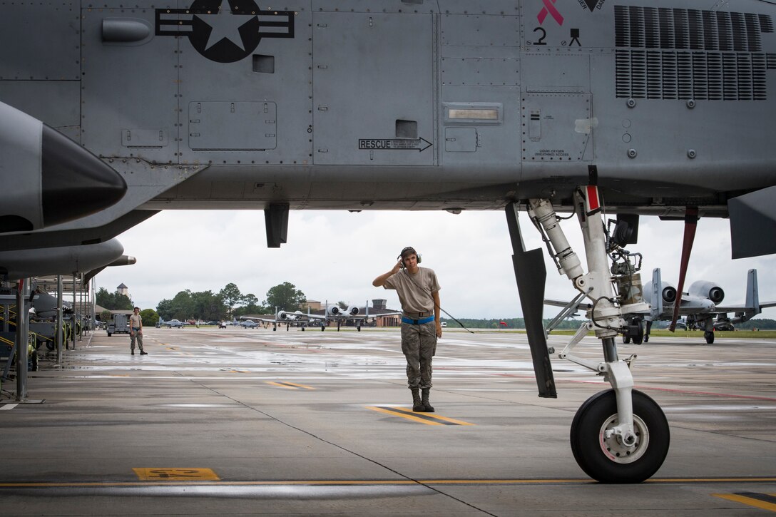 Airman 1st Class Jacob Curry, 23d Aircraft Maintenance Squadron crew chief, salutes a pilot while launching an A-10C Thunderbolt II, May 17, 2018, at Moody Air Force Base, Ga. Airmen conduct routine training missions in the airspace surrounding Moody to remain current on their tactics and procedures. While helping pilots remain proficient, training also gives crew chiefs and maintainers the opportunity to remain proficient at launching and maintaining the aircraft. (U.S. Air Force photo by Senior Airman Janiqua P. Robinson)