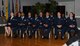 Eleven Team BLAZE members wait to receive their Community College of the Air Force degree May 10, 2018 on Columbus Air Force Base, Mississippi. With a CCAF degree, Airmen have a better chance to rank up and progress further in their career.