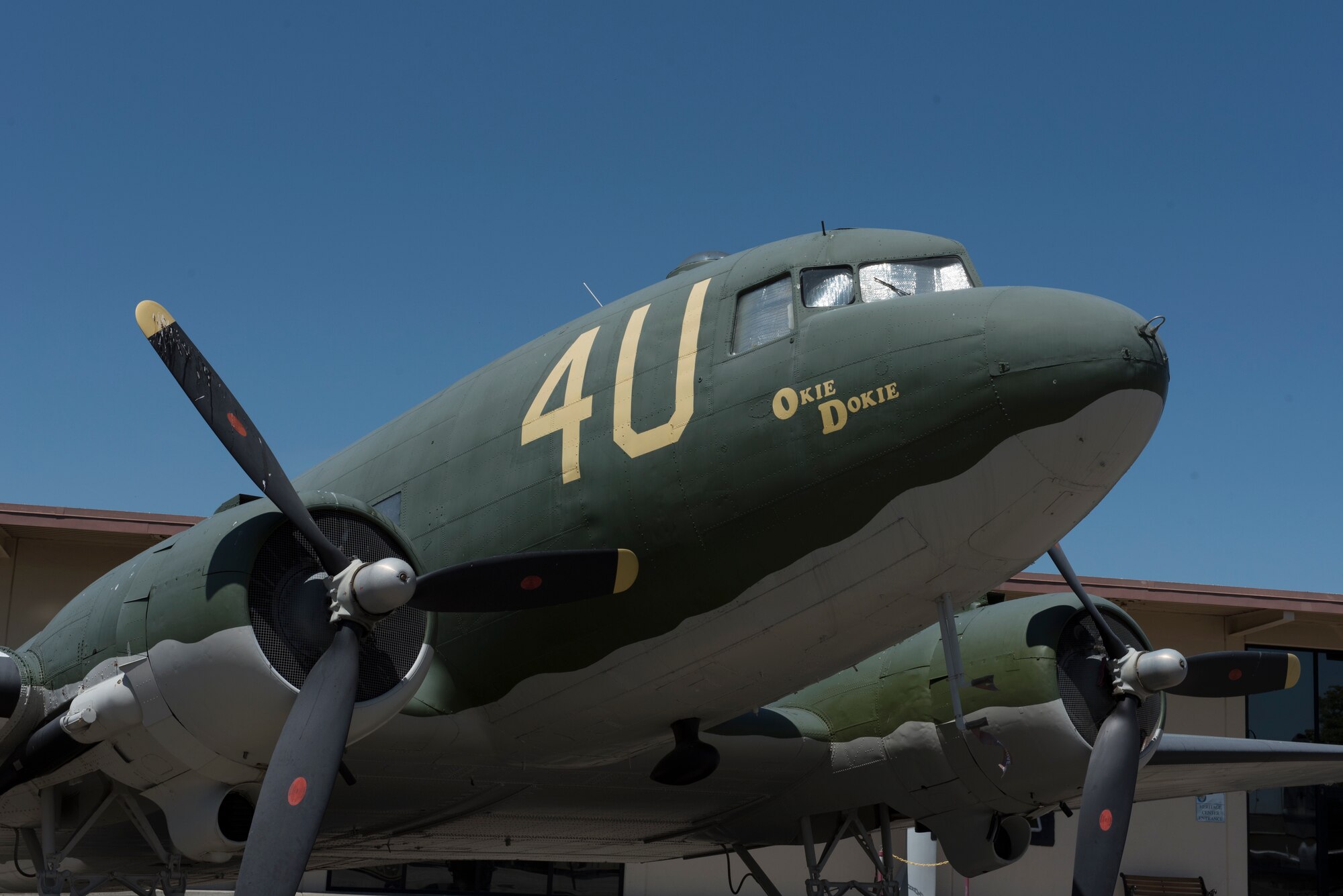 A Douglas C-47 Skytrain awaits visitors outside the Heritage Center at Travis Air Force Base, Calif., May 17, 2018. The aircraft was used extensively by the Allies in World War II to transport personnel and supplies. The C-47 also served in the Korean and Vietnam Wars. It was assigned at Travis from 1943 – 1953. The base is celebrating its 75th anniversary all year and people can learn about much of the base’s history by visiting the Heritage Center. (U.S. Air Force photo by Tech. Sgt. James Hodgman)