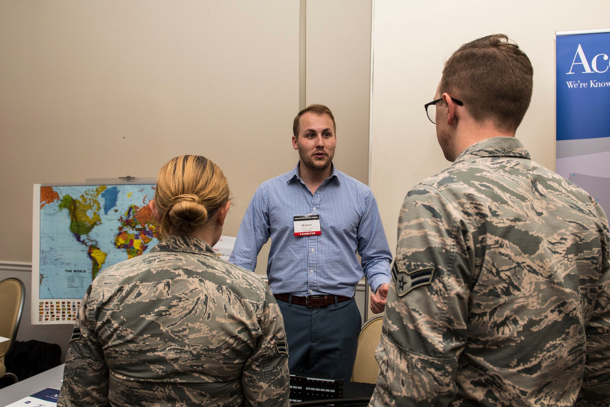 A company representative talks to Airmen about his company’s technology during a technology exposition at Shaw Air Force Base, S.C., May 16, 2018.