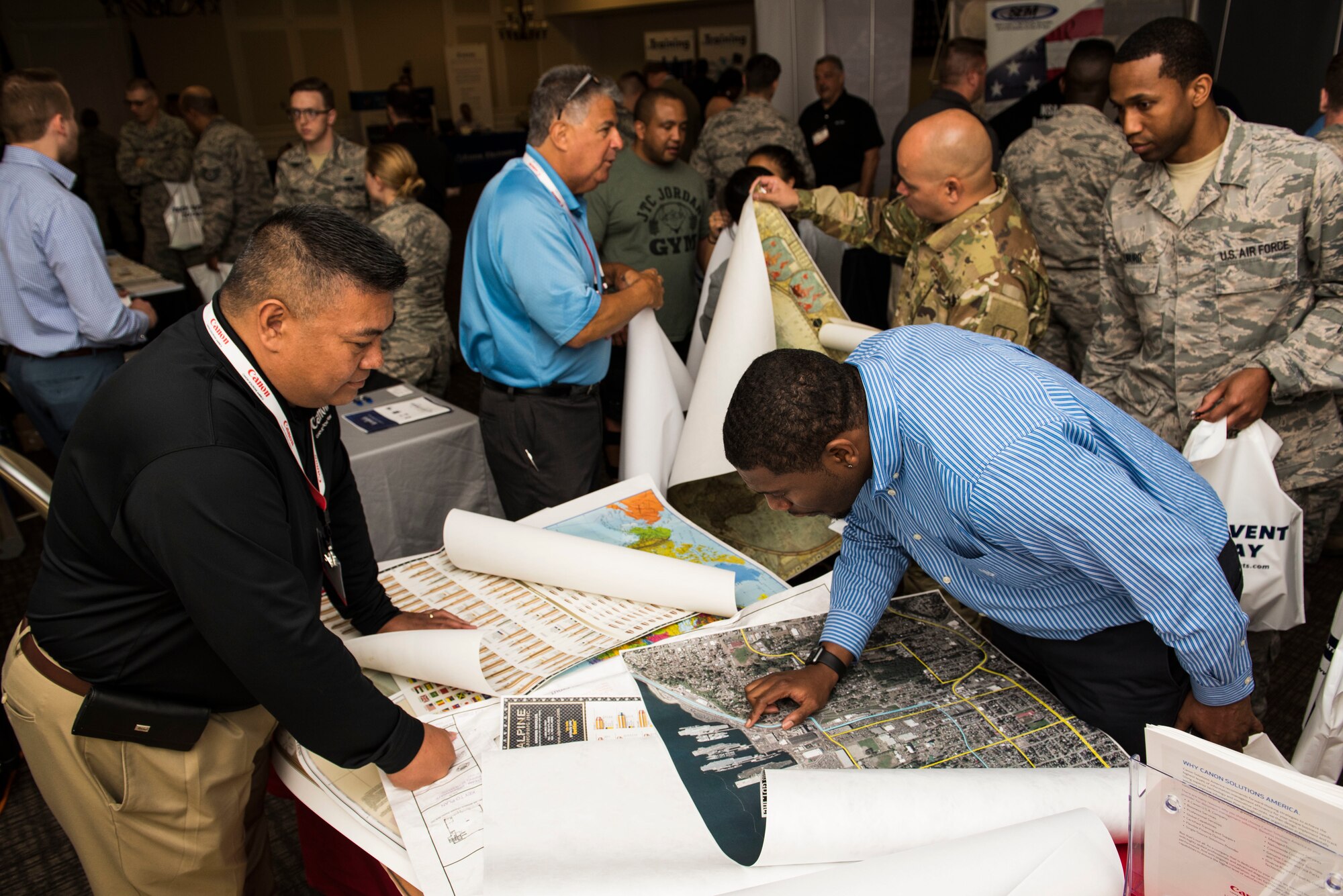 Team Shaw members network during a technology exposition at Shaw Air Force Base, S.C., May 16, 2018.