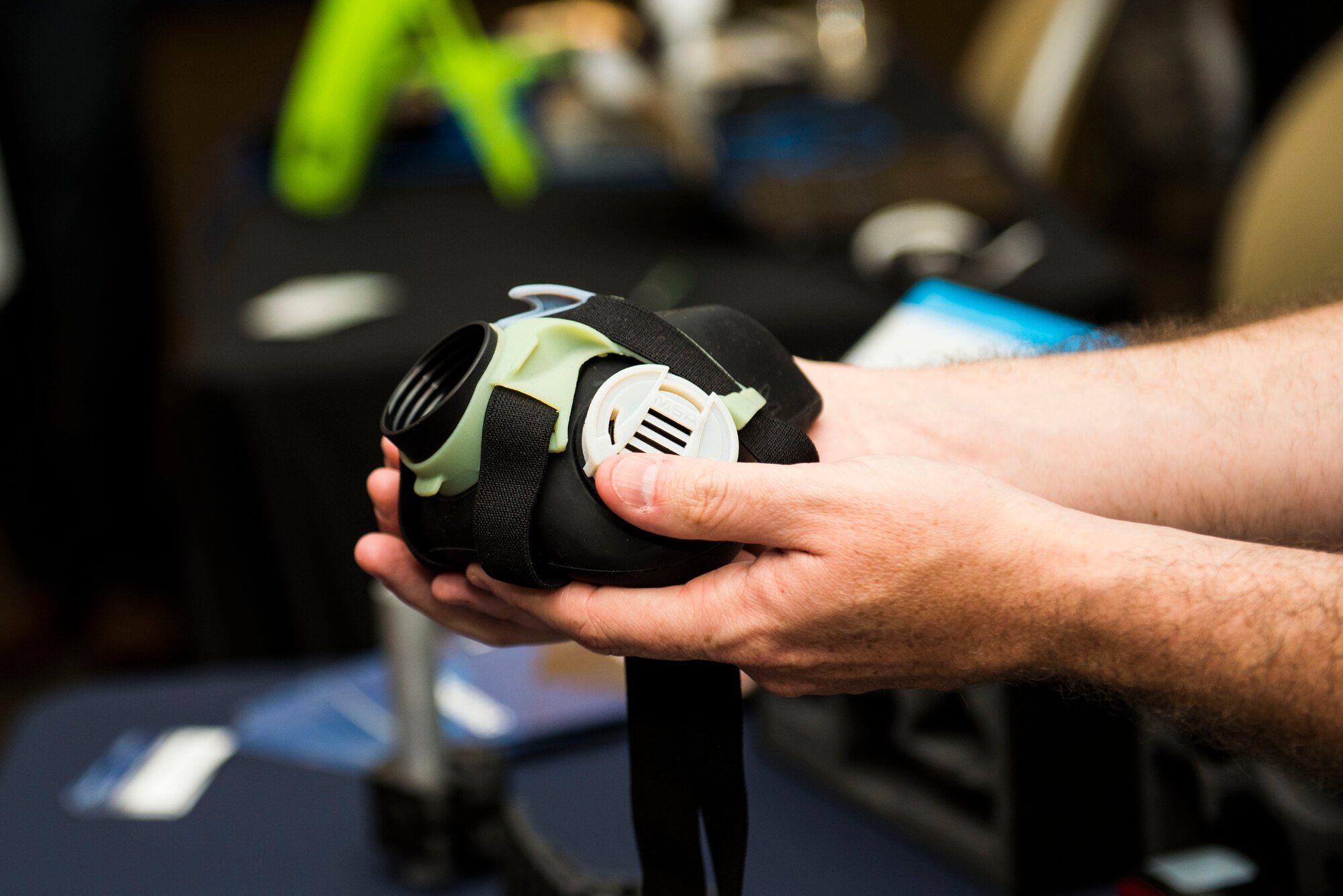 A company representative shows an example of three-dimensional (3-D) printing to a Team Shaw member during a technology exposition at Shaw Air Force Base, S.C., May 16, 2018.