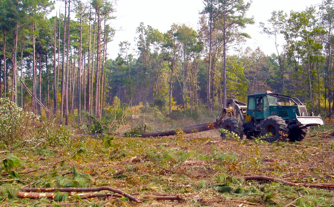 A skidder drags logs in a final harvest area at Arnold Air Force Base. Logging at Arnold is part of the Base Forest Management Program for Air Force land use, which are sustainable mission support and stewardship. (U.S. Air Force photo)