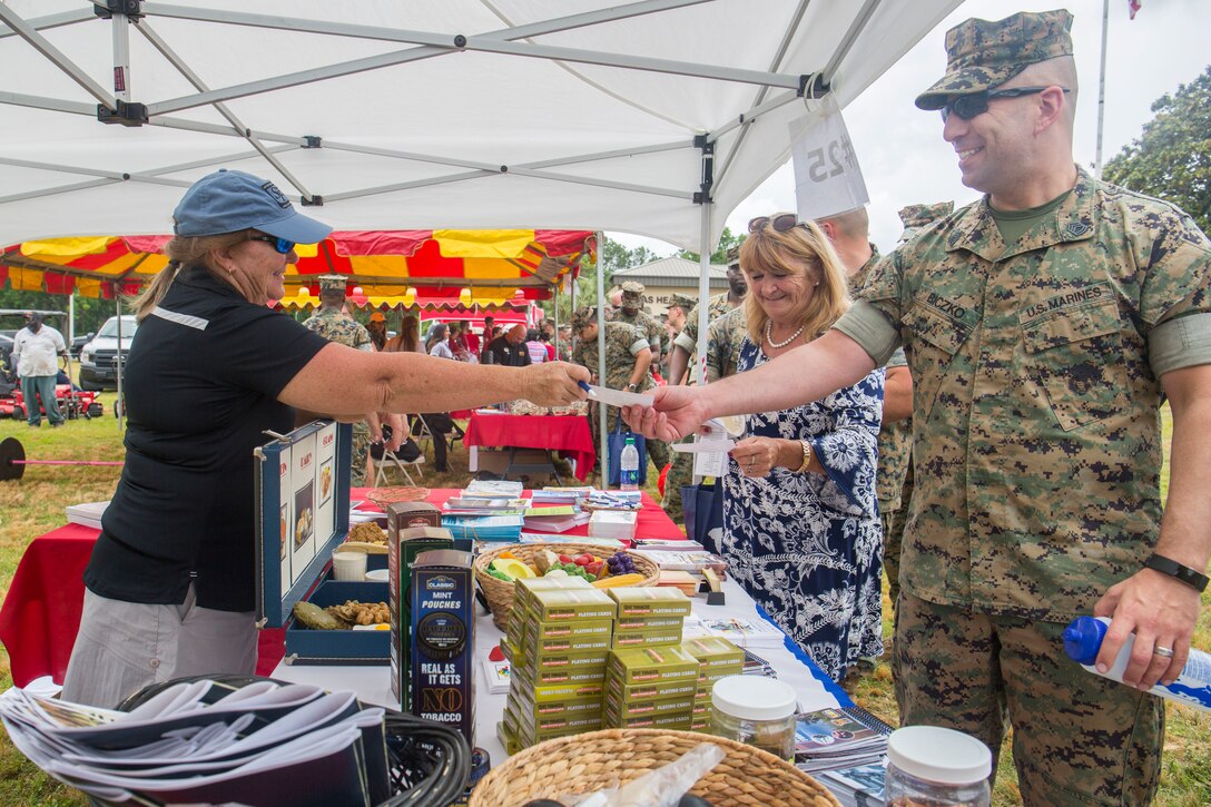A Marine gets information from a nutrition booth at the Marine Corps Air Station Beaufort safety fair aboard MCAS Beaufort May 14. A variety of booths from several organizations from the air station and the local community participated in the event to educate MCAS Beaufort personnel on the importance of safety on and off duty.