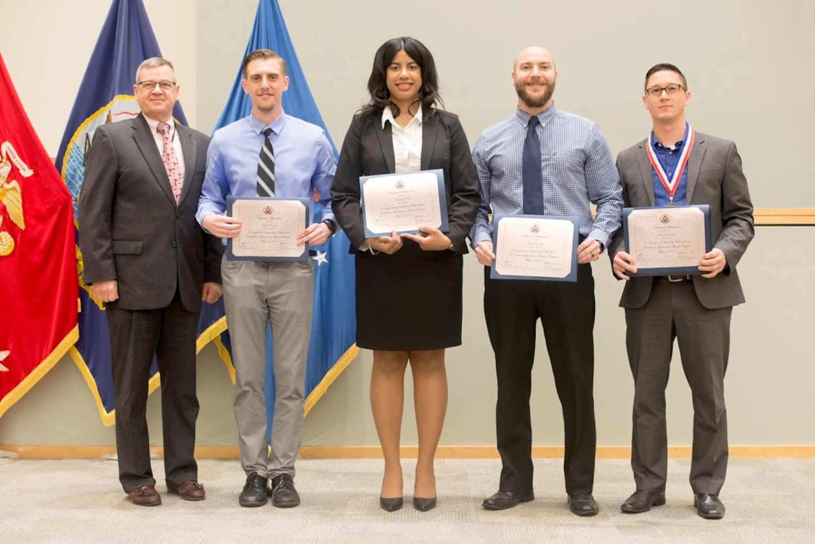 DLA Troop Support winners and nominees from the 2017 Federal Executive Board Executive Board Excellence in Government Awards pose with Troop Support Deputy Commander Richard Ellis (far left) in Philadelphia on May 17.