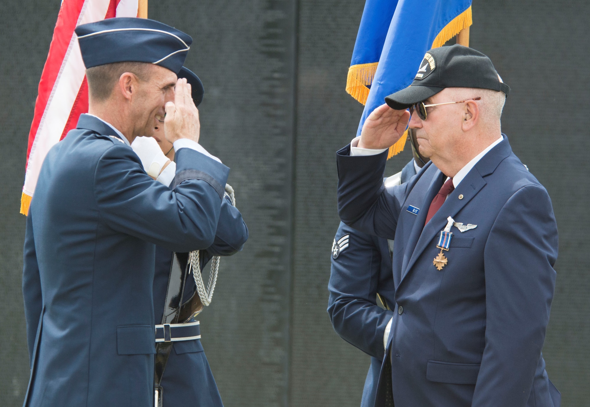 U.S. Air Force Maj. Gen. Scott Zobrist, 9th Air Force commander, returns a salute from retired Capt. Johnny Blye at The Wall That Heals in Camden, S.C., May 5, 2018.