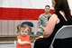 Maj. Wade Smith's daughter poses for a photo during a 94th Aircraft Maintenance Squadron assumption-of-command ceremony held at Dobbins Air Reserve Base, Ga. on May 5, 2018. Smith has been at Dobbins since last summer, when he took a position as operations officer for the 94th Maintenance Squadron. (U.S. Air Force photo/Senior Airman Josh Kincaid)