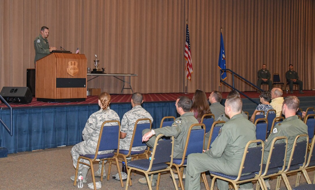 U.S. Air Force Lt. Col. William Fish, 11th Bomb Squadron commander, introduces the guest speaker of the B-52 Stratofortress Formal Training Unit Class 17-03 graduation ceremony, Chief Master Sgt. Thomas Mazzone, the command chief master sergeant of Air Force Global Strike Command, on Barksdale Air Force Base, Louisiana, May 18, 2018.