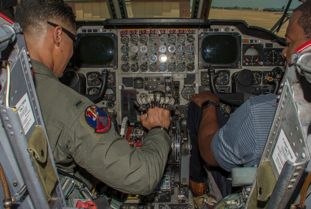 A graduate from the B-52 Stratofortress Formal Training Unit Class 17-03 shows off the flight controls of the B-52 on Barksdale Air Force Base, Louisiana, May 18, 2018.