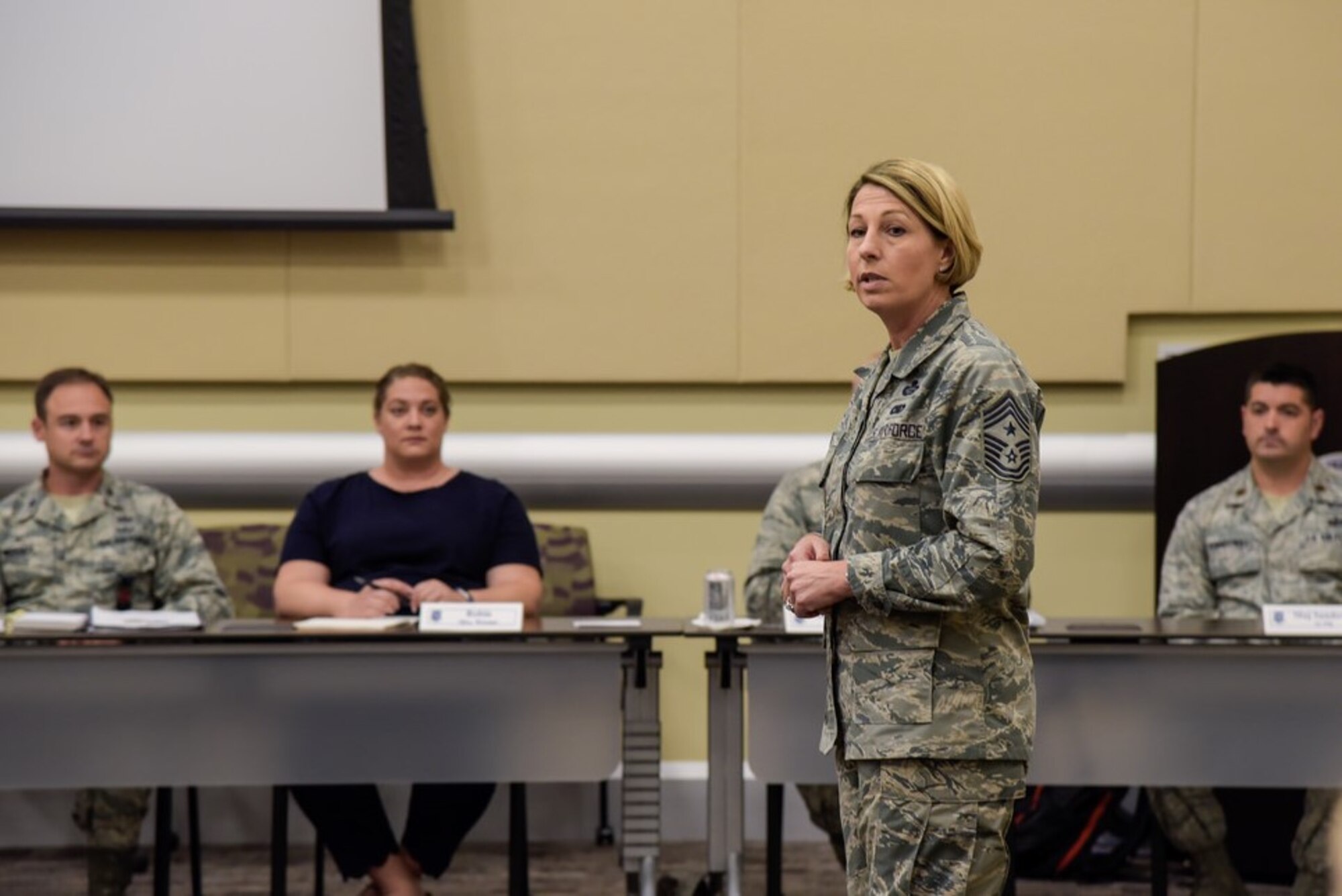 Air Force District of Washington Command Chief Master Sgt. Melanie K. Noel discusses the value of courageous leadership in remarks during the 2018 AFDW Squadron Commanders Course in the Gen. Jacob E. Smart Conference Center here May 18.