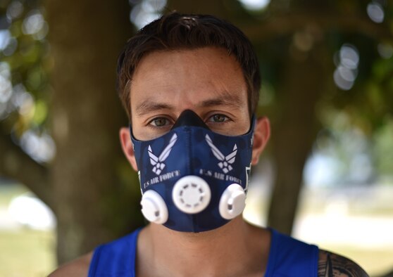 U.S. Air Force Wounded Warrior Master Sgt. Kenneth Guinn, 325th Civil Engineering Squadron Explosive Ordnance Disposal Logistics section chief, wears an elevation training mask at Tyndall Air Force Base, Fla., May 15, 2018.  The mask helps prepare him to compete in the higher elevation levels of Colorado, where the 2018 Warrior Games is scheduled to take place. (U.S. Air Force photo by Airman 1st Class Delaney Gonzales/Released)
