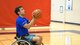 U.S. Air Force Wounded Warrior Master Sgt. Kenneth Guinn, 325th Civil Engineering Squadron Explosive Ordnance Disposal Logistics section chief, practices wheelchair basketball at Tyndall Air Force Base, Fla., May 15, 2018. Guinn was selected to participate in the 2018 Warrior Games for track, field, archery, power-lifting, sitting volley ball and wheelchair basketball. (U.S. Air Force photo by Senior Airman Tybee Hurst/Released)