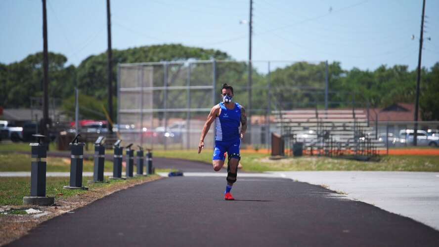 U.S. Air Force Wounded Warrior Master Sgt. Kenneth Guinn, 325th Civil Engineering Squadron Explosive Ordnance Disposal Logistics section chief, readies an arrow on a recurve bow at Tyndall Air Force Base, Fla., May 15, 2018. Guinn was selected to participate in the 2018 Warrior Games for track, field, archery, power-lifting, sitting volley ball and wheelchair basketball. (U.S. Air Force photo by Airman 1st Class Delaney Gonzales/Released)