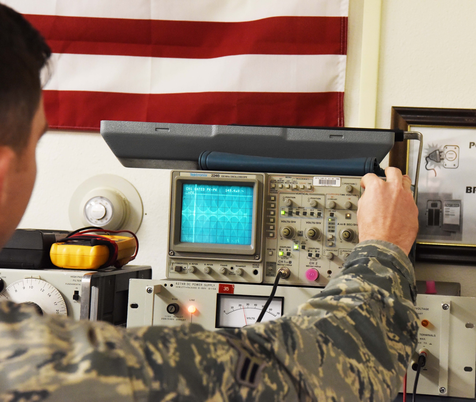 Airman 1st Class Mason Kitchens, a 28th Communications Squadron radio frequency transmission systems technician, uses an oscilloscope, which is a device used to see changes in an electrical signal over time during the Cyber Storm exercise at Ellsworth Air Force Base, S.D., May 14, 2018. Cyber Storm is in its second year and is used to help the 28th CS find cybersecurity weaknesses so they can be more effective in a cyber-contested environment. (U.S. Air Force photo by Airman 1st Class Thomas Karol)