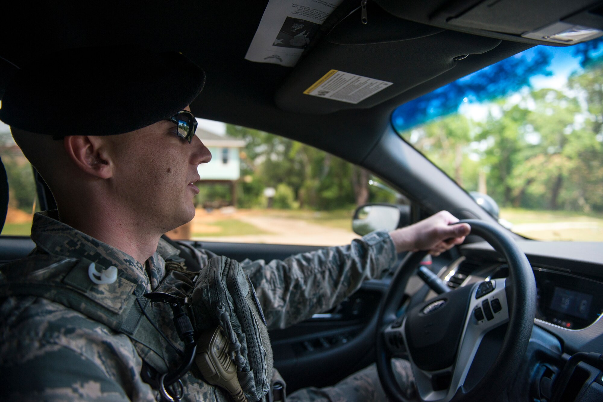 Tech. Sgt. Jarrod Kinard, 81st Security Forces Squadron flight chief, patrols the perimeter during a ride-along at Keesler Air Force Base, Miss., May 17, 2018. The ride-along program is part of the 81st SFS community involvement initiative where anyone, age 15 and up and with base access, can see what it's like to be a defender. If you are interested in the ride-along program, please contact Tech. Sgt. Matthew Oleson at 228-376-6601. (U.S. Air Force photo by Senior Airman Travis Beihl)