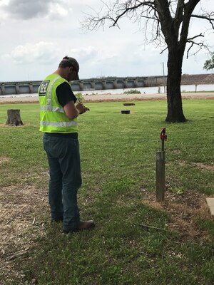 Michael Tate writes down Geographic Information System data for real property at John Redmond Lake in Burlington, Kansas. Tate shadowed the John Redmond Project Office staff from August 2017 to May 2018.