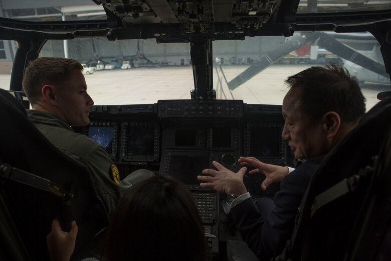 U.S. Marines provide Councillor Yamada Hiroshi, Japan Diet Upper House Member, with a tour of an MV-22B Osprey tiltrotor aircraft on Marine Corps Base Hawaii April 30, 2018.