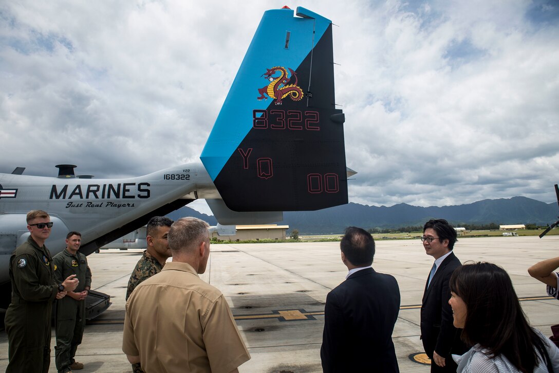 U.S. Marines provide Councillor Yamada Hiroshi, Japan Diet Upper House Member, with a tour of an MV-22B Osprey tiltrotor aircraft on Marine Corps Base Hawaii April 30, 2018. Yamada visited Hawaii to learn more about Marine Corps’ amphibious capabilities, the MV-22B Osprey tiltrotor aircraft, the AAV-P7/A1 assault amphibious vehicle, and the logistics cooperation between the two nations. The installation tour also provided Yamada a deeper understanding of how the base supports the Marine Air-Ground Task Force operating in Japan. (U.S. Marine Corps photo by Sgt. Zachary Orr)
