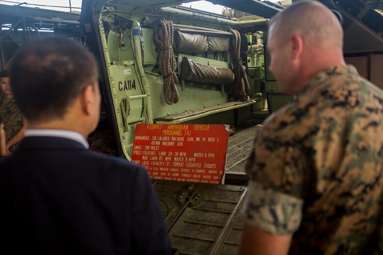 U.S. Marines provide Councillor Yamada Hiroshi, Japan Diet Upper House Member, with a tour of an AAV-P7/A1 assault amphibious vehicle on Marine Corps Base Hawaii April 30, 2018.