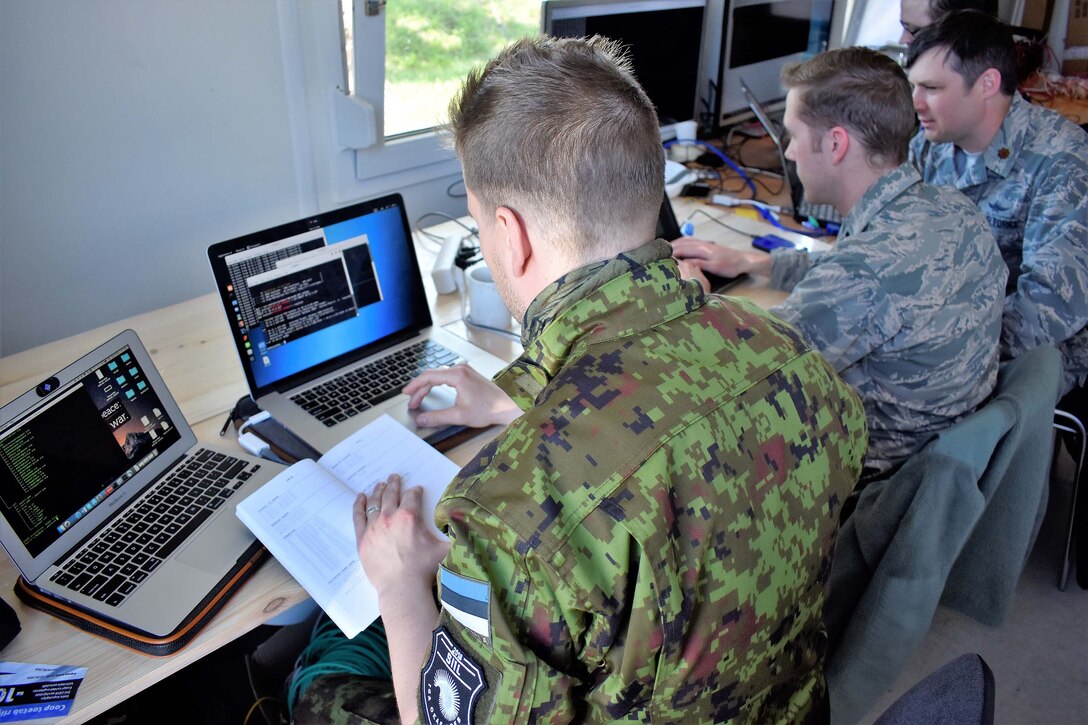 Maryland Guard cyber warfare operators from the 175th Wing's Cyber Operations Group support Exercise Hedgehog May 7, 2018, in Southern Estonia. The Cyber personnel advise and assist Estonian Defense Force and Estonia Defense League members to evaluate internal policy for cyber-related activities.