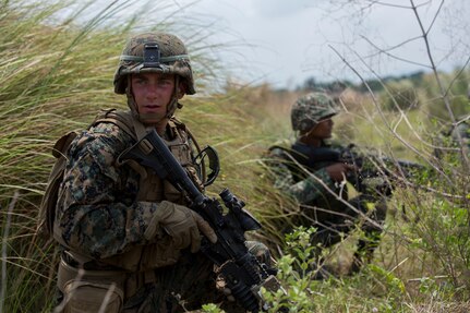 U.S. Marine Corps Lance Cpl. Nic Arendale, a grenadier assigned to 2nd Battalion, 8th Marine Regiment and Philippine Marines with 10th Marines Company provide security on the beach during the amphibious landing exercise as part of Exercise Balikatan at the Naval Education and Training Center, in San Antonio, Zambales, Philippines May 8, 2018. This training is held to further interoperability between the U.S. and the Philippines while conducting amphibious exercises. Exercise Balikatan, in its 34th iteration, is an annual U.S.-Philippine military training exercise focused on a variety of missions, including humanitarian assistance and disaster relief, counterterrorism and other combined military operations held from May 7 to 18. (U.S. Marine Corps photo by Pfc. Krysten I. Gomez)