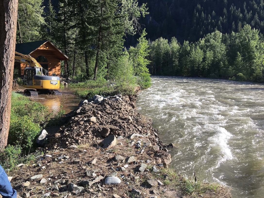 Flood teams from U.S. Army Corps of Engineers strengthened a section of the Lost River levee in Mazama, Wash.
