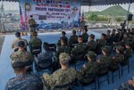Royal Navy Capt. Peter Olive, Deputy Mission Commander of Pacific Partnership 2018 (PP18), delivers remarks during the opening ceremony of Pacific Partnership 2018 (PP18) Thailand aboard Military Sealift Command expeditionary fast transport ship USNS Brunswick (T-EPF 6). PP18’s mission is to work collectively with host and partner nations to enhance regional interoperability and disaster response capabilities, increase stability and security in the region, and foster new and enduring friendships across the Indo-Pacific Region. Pacific Partnership, now in its 13th iteration, is the largest annual multinational humanitarian assistance and disaster relief preparedness mission conducted in the Indo-Pacific.